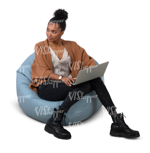 cut out woman sitting on a bean bag chair with a laptop