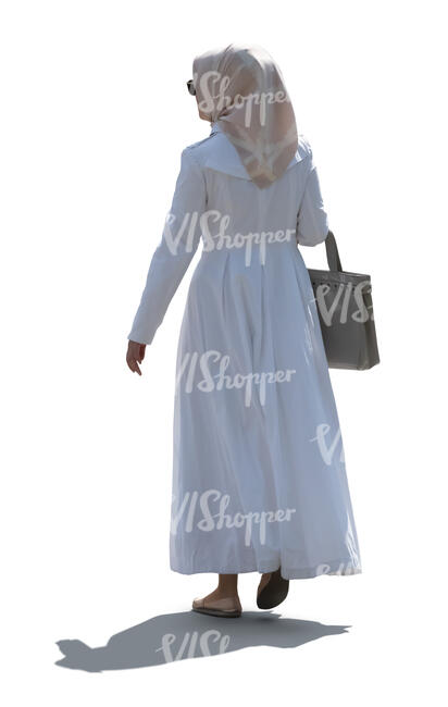 cut out backlit muslim woman walking