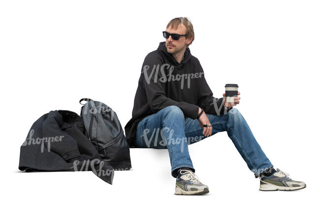 cut out man sitting on the stairs and drinking coffee