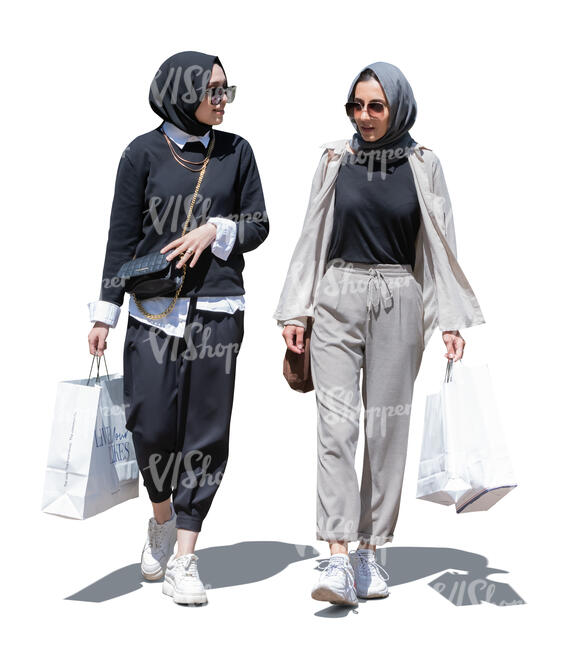 two cut out young muslim women walking