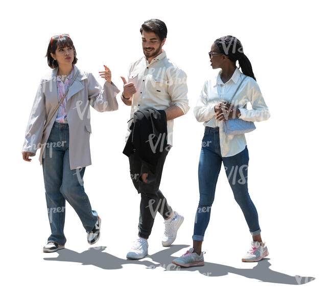 cut out backlit group of three people walking and talking