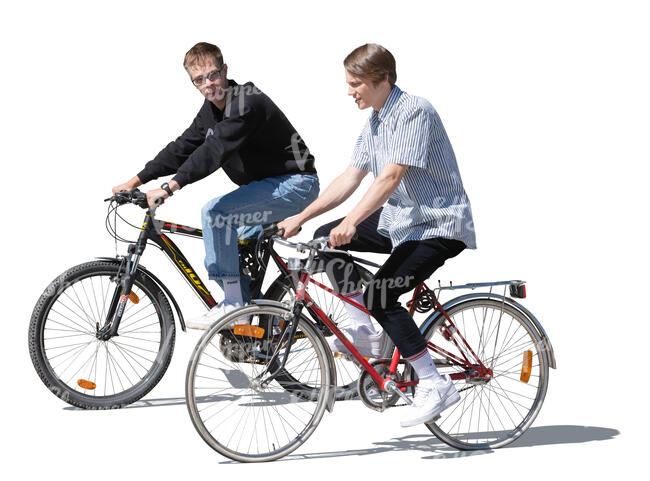 two cut out teenage boys cycling and talking