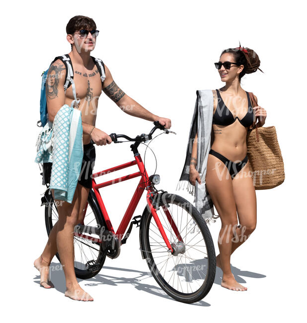 cut out man and woman walking on the beach with a bike