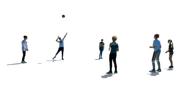 cut out backlit group of children playing volleyball