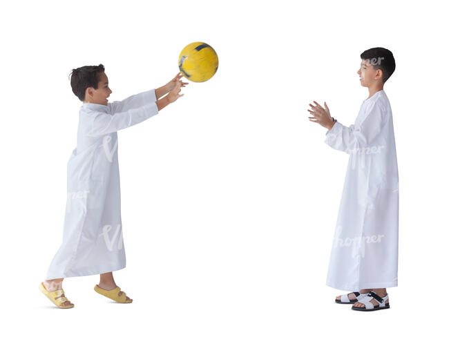 two cut out arab boys in traditional clothing playing ball