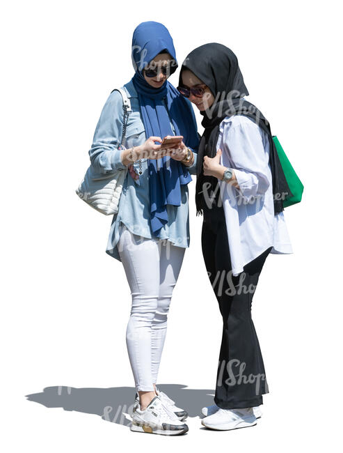 two cut out young middle east girls standing with a phone