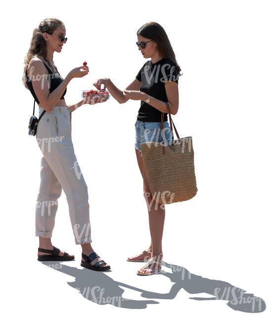 two cut out women standing and eating strawberries