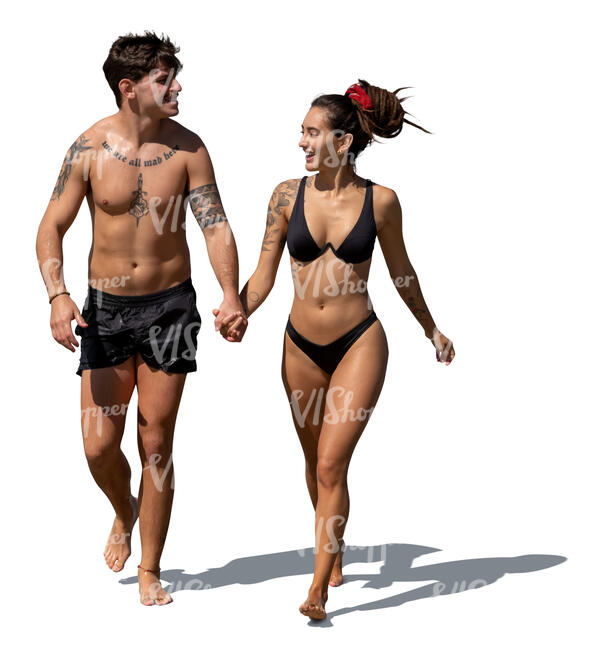 cut out couple walking happily on the beach