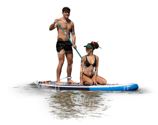 cut out man and woman paddleboarding