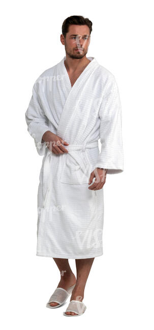 cut out man in a white spa bathrobe walking