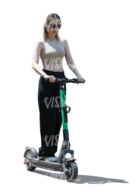 cut out backlit woman riding and electric scooter