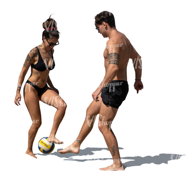 cut out man and woman at the beach playing football