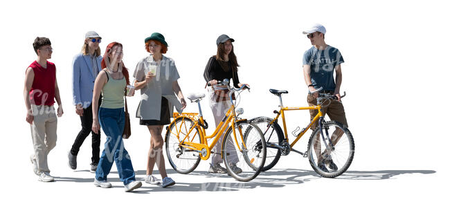 cut out backlit group of teenagers with bikes walking and talking