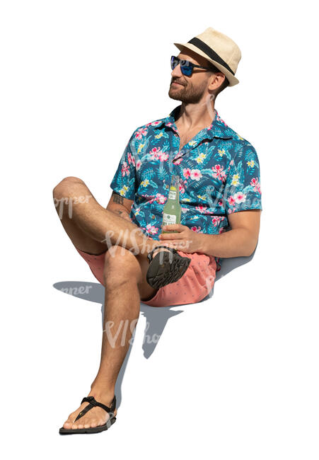 cut out man with a summer hat sitting and drinking a soft drink