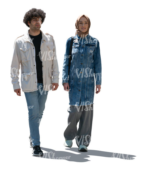 cut out backlit middle eastern man and woman walking