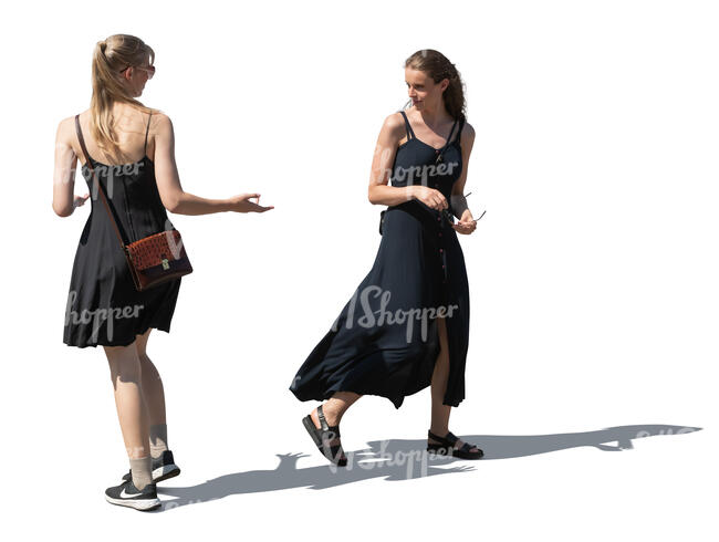 two cut out women greeting while walking on the street