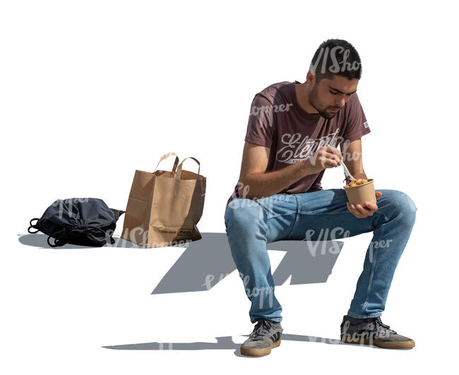 cut out man sitting and eating lunch