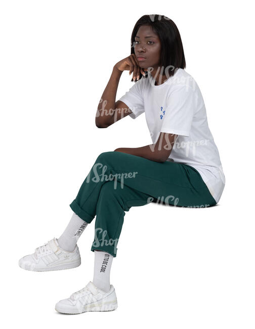 cut out black woman sitting and leaning on a table