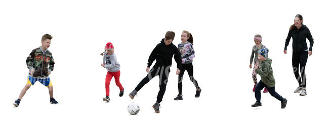 cut out group of children playing football at a sport class