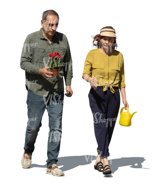 two older people going to plant flowers in the garden