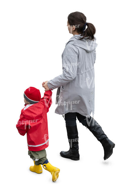 mother and son walking on a rainy autumn day seen from above