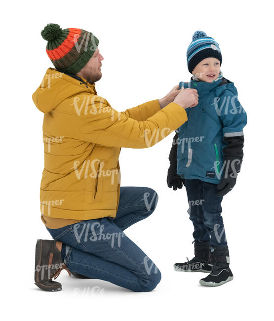 father adjusting his sons scarf in winter
