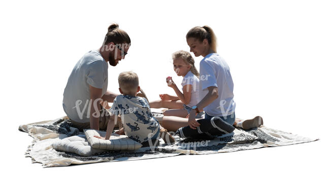 cut out backlit family having a picnic outside