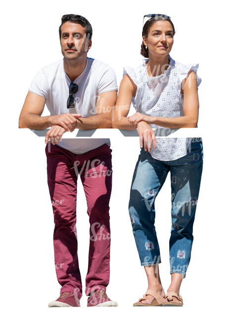 man and woman standing up on a balcony and leaning on a railing