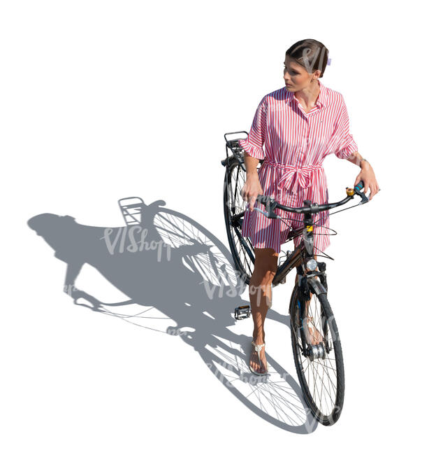 cut out woman with a bike standing seen from above