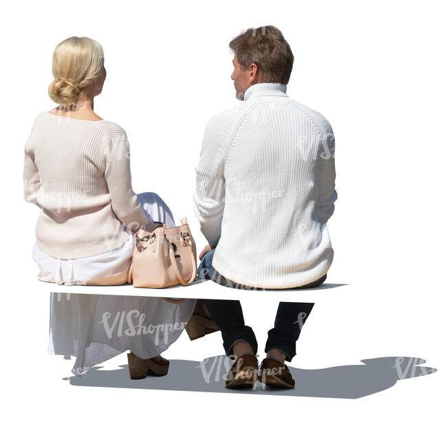 two cut out older people sitting