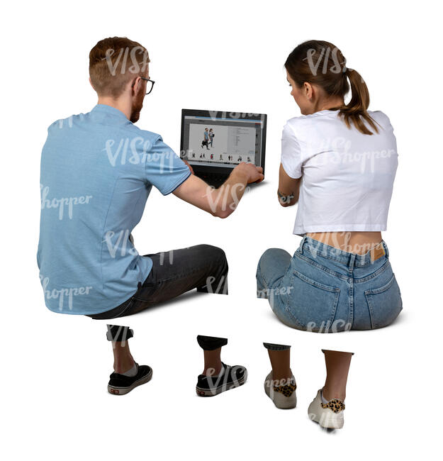 two cut out people sitting at a desk with computer and working