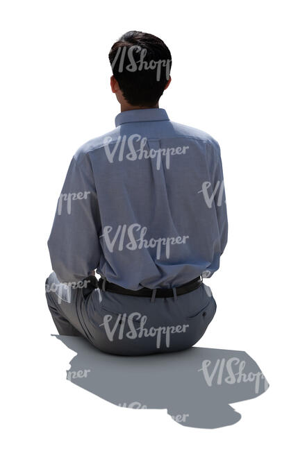 cut out backlit man sitting seen from back angle