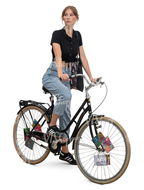 woman on a bicycle waiting and looking around