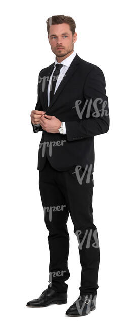 cut out man in a black suit standing