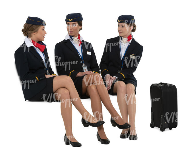 three cut out flight attendants sitting and talking