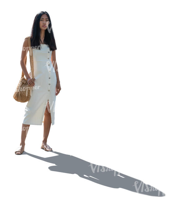 cut out backlit asian woman in a white summer dress standing