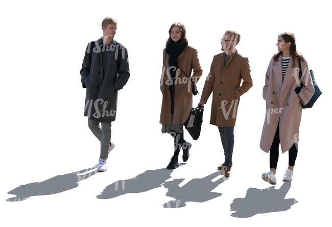 backlit group of people walking in early spring