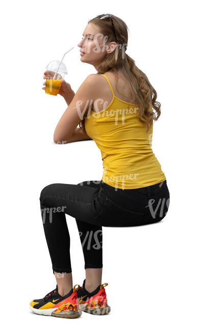woman sitting and drinking orange juice