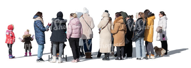 large group of people standing outside on a sunny winter day