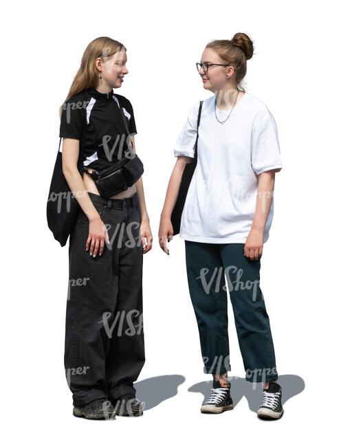 two teenage girls standing and talking