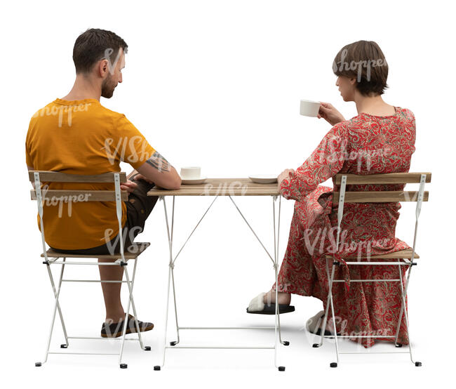two cut out people sitting in a coffeeshop seen from back angle