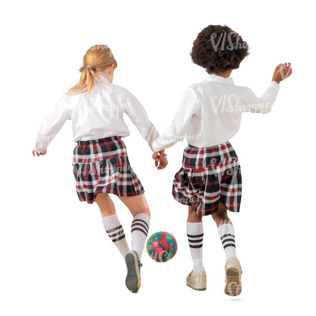 two cut out schoolgirls playing football