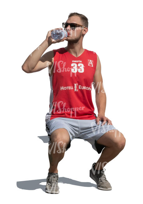 cut out sportsman sitting and drinking water