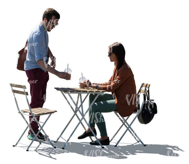 backlit scene of a casual coffeeshop with two people