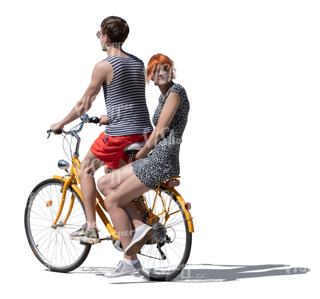 man riding a bike and woman sitting in the rack