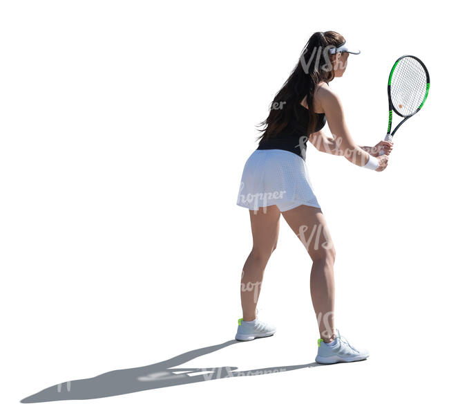 cut out backlit woman playing tennis