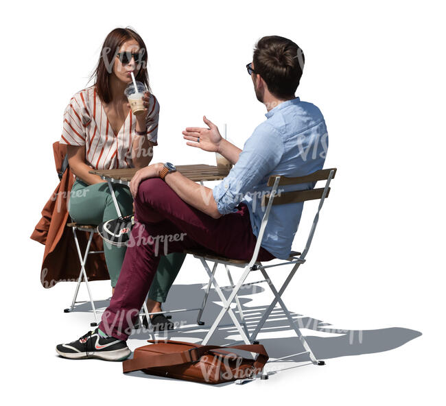 two people sitting in a casual cafe and talking