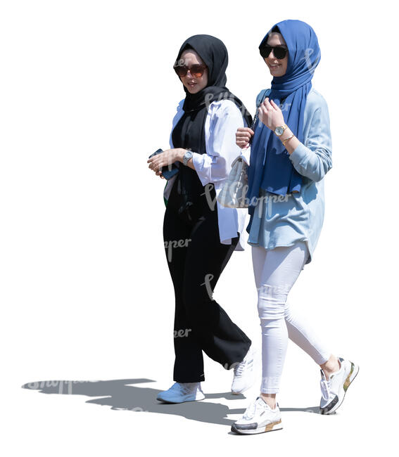 two cut out young muslim women walking