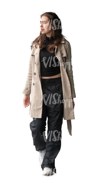 cut out latin woman in a trenchcoat walking