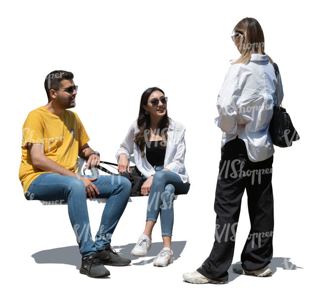 cut out woman standing and talking to her two friends sitting on a bench